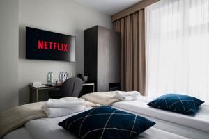 4Wings Apartments客房内的一张或多张床位