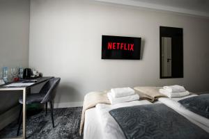 4Wings Apartments客房内的一张或多张床位