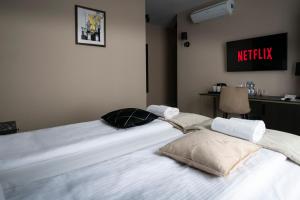 4Wings Apartments客房内的一张或多张床位