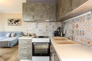 Kuchyň nebo kuchyňský kout v ubytování Entheon Olive Villas - Poolside Retreats