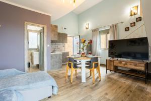 Kuchyň nebo kuchyňský kout v ubytování Entheon Olive Villas - Poolside Retreats