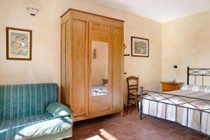 En eller flere senge i et værelse på Appartamento in Vigna Gallina