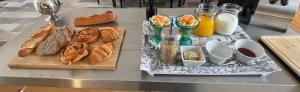 a table with various types of bread and eggs at Le Cherche Midi, entre Nîmes, le Pont du Gard, Uzès, Arles in Marguerittes