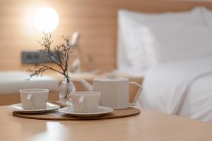 Rúm í herbergi á Aank Hotel Daejeon Yongjeon 2nd