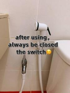 a bathroomafter usingalways be closed the switch at SSR Stay n rest 887芙蓉休闲站民宿 in Seremban