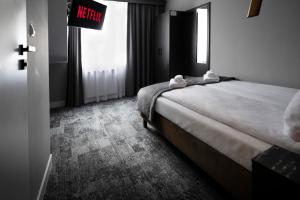 4Wings Apartments客房内的一张或多张床位