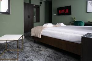 4Wings Apartments客房内的一张或多张床位