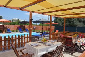 The swimming pool at or close to Filippos Green Villa