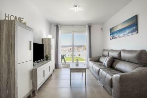 Μια τηλεόραση ή/και κέντρο ψυχαγωγίας στο Apartamento Poniente