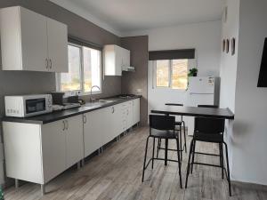 Kuchyň nebo kuchyňský kout v ubytování Casa el campo