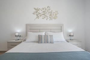 Ένα ή περισσότερα κρεβάτια σε δωμάτιο στο Apartamento Poniente +18 φωτογραφίες