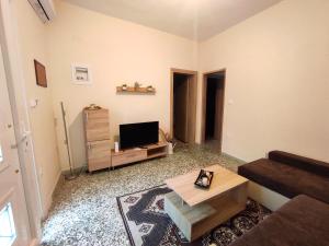 Μια τηλεόραση ή/και κέντρο ψυχαγωγίας στο NP Apartment