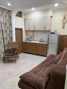 Una cocina o cocineta en Гостевой дом