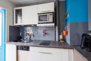 Köök või kööginurk majutusasutuses LE GRAVEREND