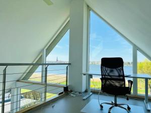 Fotografie z fotogalerie ubytování Lichtdurchflutete Ferienwohnung mit direktem Schleiblick v destinaci Fahrdorf