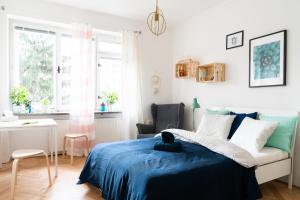 Postel nebo postele na pokoji v ubytování Jaselská Rooms - Brno Center