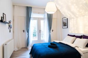 Postel nebo postele na pokoji v ubytování Jaselská Rooms - Brno Center