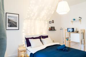 Postel nebo postele na pokoji v ubytování Jaselská Rooms - Brno Center