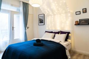 Postel nebo postele na pokoji v ubytování Jaselská Rooms - Brno Center