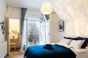 Postel nebo postele na pokoji v ubytování Jaselská Rooms - Brno Center