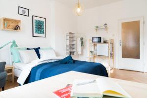 Postel nebo postele na pokoji v ubytování Jaselská Rooms - Brno Center