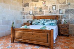 Katil atau katil-katil dalam bilik di Laremi Gozo B&B