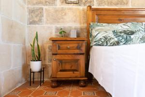 Katil atau katil-katil dalam bilik di Laremi Gozo B&B