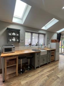 a kitchen with a sink and a counter top at York House in Retford