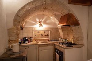 Köök või kööginurk majutusasutuses Il Trullo Moore Alberobello