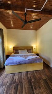 Una cama o camas en una habitación de Namlang Resort