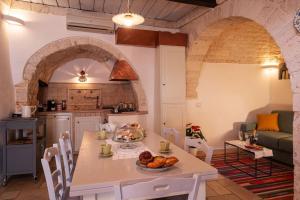 Kuchyň nebo kuchyňský kout v ubytování Il Trullo Moore Alberobello