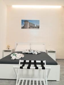 Postel nebo postele na pokoji v ubytování Dimora Pié del Castello