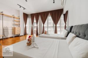 Ένα ή περισσότερα κρεβάτια σε δωμάτιο στο Regalia Residence @ KLCC View Sky Pool by KC +226 φωτογραφίες