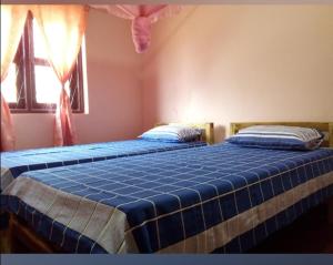 Letto o letti in una camera di Batti Relax Point