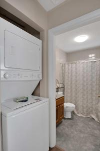 a small bathroom with a toilet and a sink at Small 2br East Knox apartment Pet friendly in Knoxville