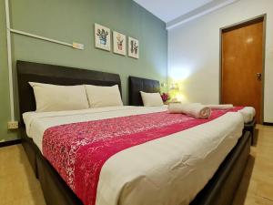 Postel nebo postele na pokoji v ubytování Treeline Urban Inn