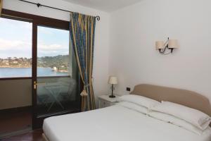 Cama o camas de una habitación en Albergo Filippo II