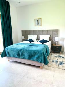ELFF -Apartamenty i pokoje gościnne客房内的一张或多张床位