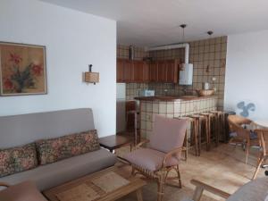 Kuchyň nebo kuchyňský kout v ubytování APARTAMENT AMB GRAN TERRASSA