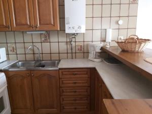 Kuchyň nebo kuchyňský kout v ubytování APARTAMENT AMB GRAN TERRASSA + 11 fotografií