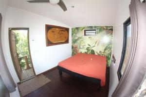 Een bed of bedden in een kamer bij Villa vue exceptionnelle