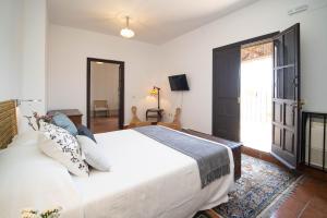 Posteľ alebo postele v izbe v ubytovaní La Casa 1832 Boutique + 37 fotografií
