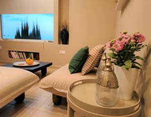 Ένα ή περισσότερα κρεβάτια σε δωμάτιο στο GARDEN APARTMENT 1 VERGA