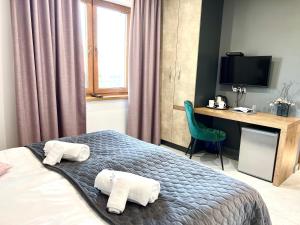 ELFF -Apartamenty i pokoje gościnne客房内的一张或多张床位