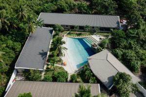 an overhead view of a swimming pool in a resort at Hidden Lagoon Resort in Panglao Island