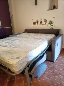 Postel nebo postele na pokoji v ubytování Locazione turistica La Gesualda
