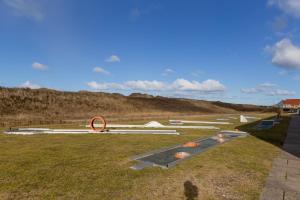 a row of skate parks on a grass field at Agger Holidays in Vestervig