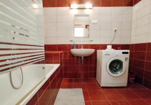 Ванна кімната в Keleti Aparthotel