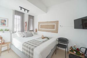 Posteľ alebo postele v izbe v ubytovaní Urban Beach Studio