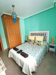 Postel nebo postele na pokoji v ubytování Apartamento El Zapillo